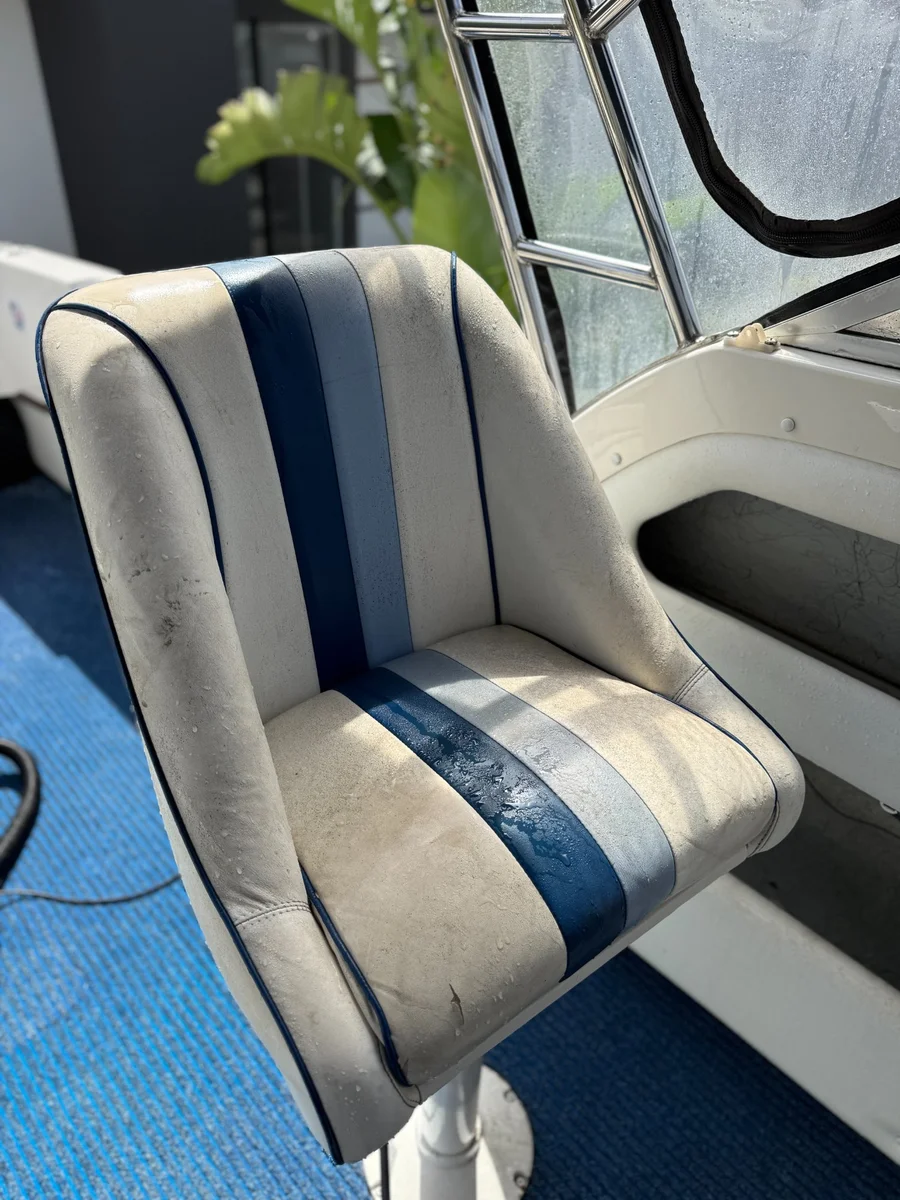 Before boat interior upholstery detail Perth WA — stained seat