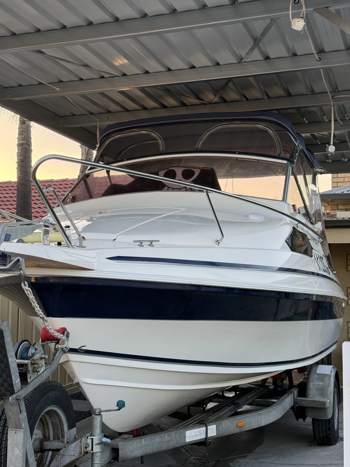 Foam on Wheels boat detailing Perth WA result — Caribbean cuddy cabin detailed on driveway